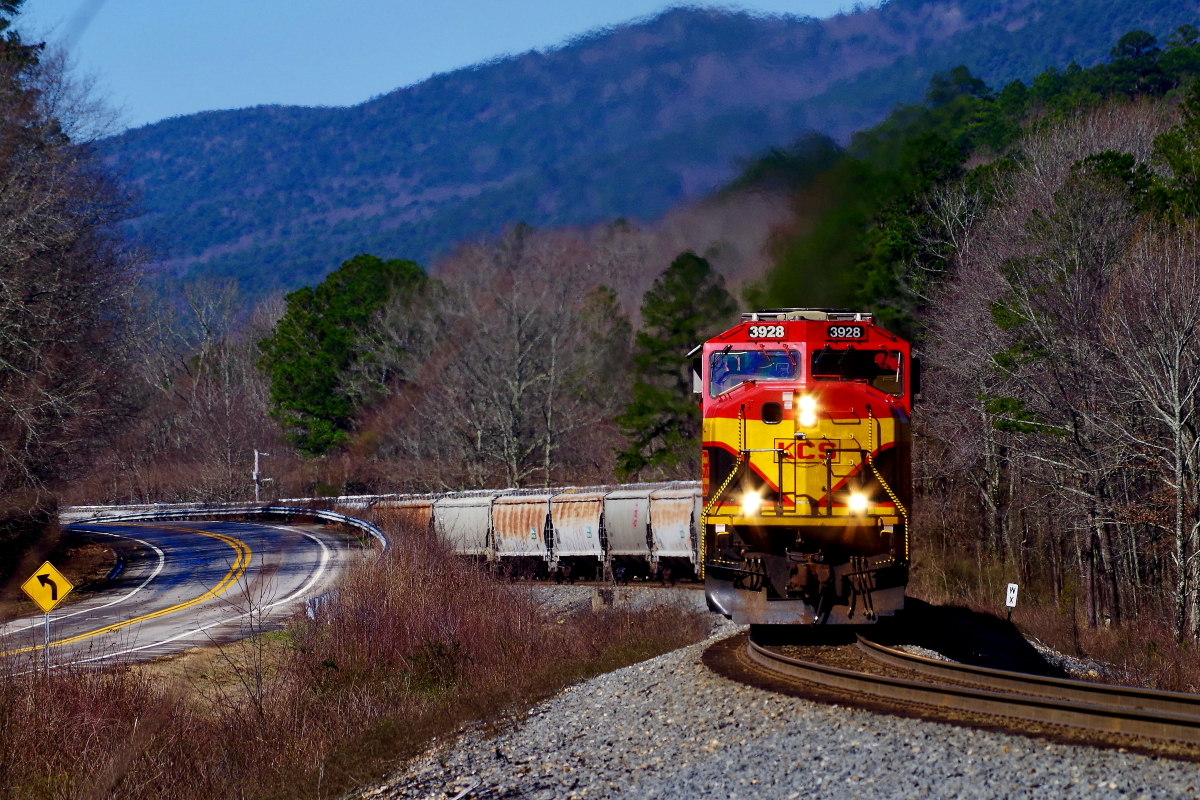 KCS 3928 is a class EMD SD70MAC and  is pictured in Rich Mountain, Arkansas, USA.  This was taken along the Shreveport/KCS on the Kansas City Southern Railway. Photo Copyright: Rick Doughty uploaded to Railroad Gallery on 03/25/2024. This photograph of KCS 3928 was taken on Saturday, March 09, 2019. All Rights Reserved. 